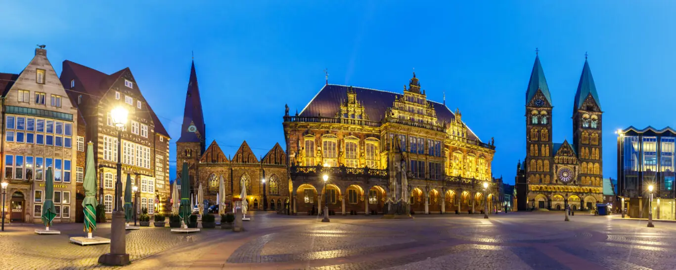 Bremen market square town hall Dom church Roland panoramic view in Germany at night blue hour