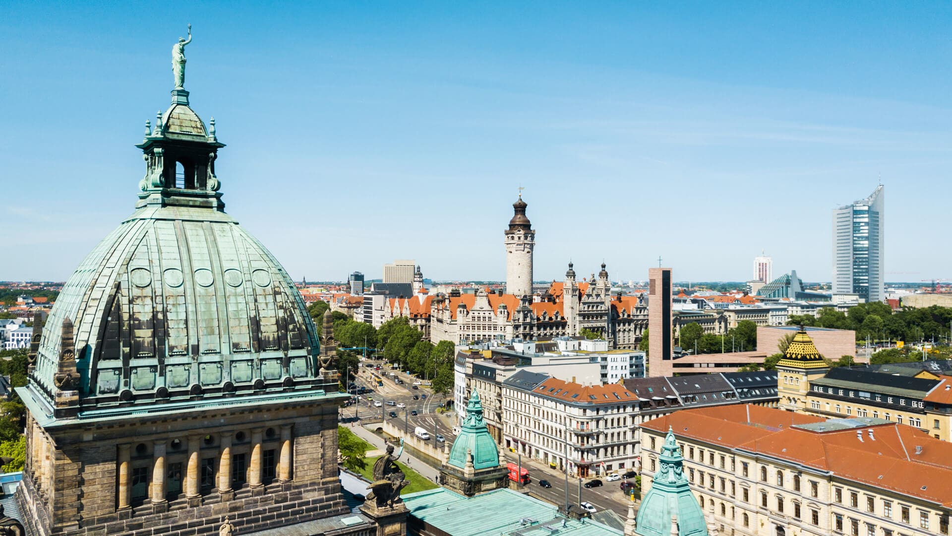 Panoramic view of Leipzig skyline with Old Town Hall and historic buildings in the city center.