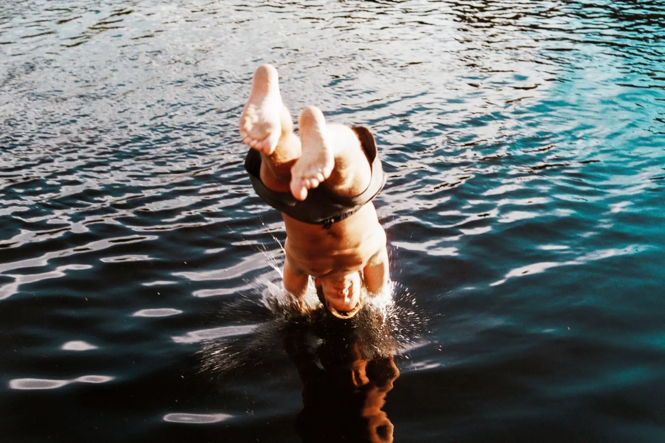 Man jumping into the Aare. Stay KooooK. Stay You.